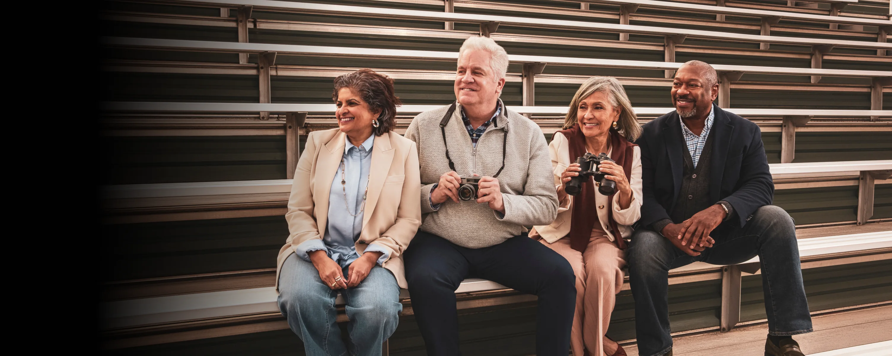 A group of older adults cheering on gym bleachers. A green banner reads “Protect your patients with comorbidities from severe COVID-19”
