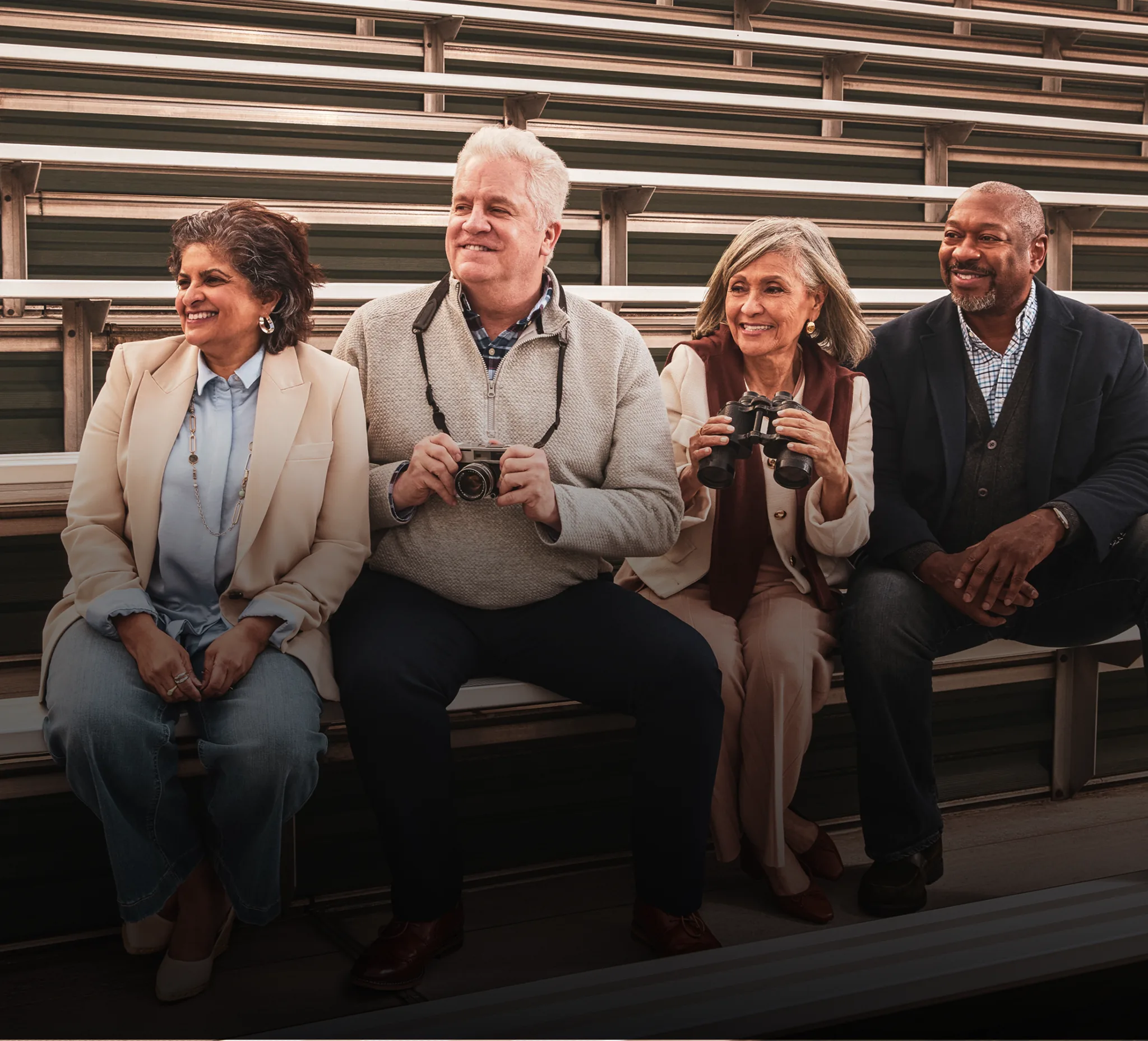 A group of older adults cheering on gym bleachers. A green banner reads “Protect your patients with comorbidities from severe COVID-19”